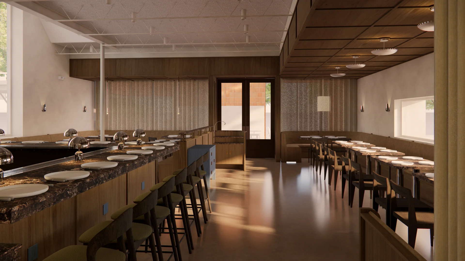 A modern restaurant interior featuring dual chef counters with dark granite tops and wood paneling on either side, accented by olive-green upholstered seating and warm recessed lighting. The open-concept dining space showcases a polished concrete floor, cream-colored walls, a coffered wood ceiling, and expansive windows that flood the space with natural light.