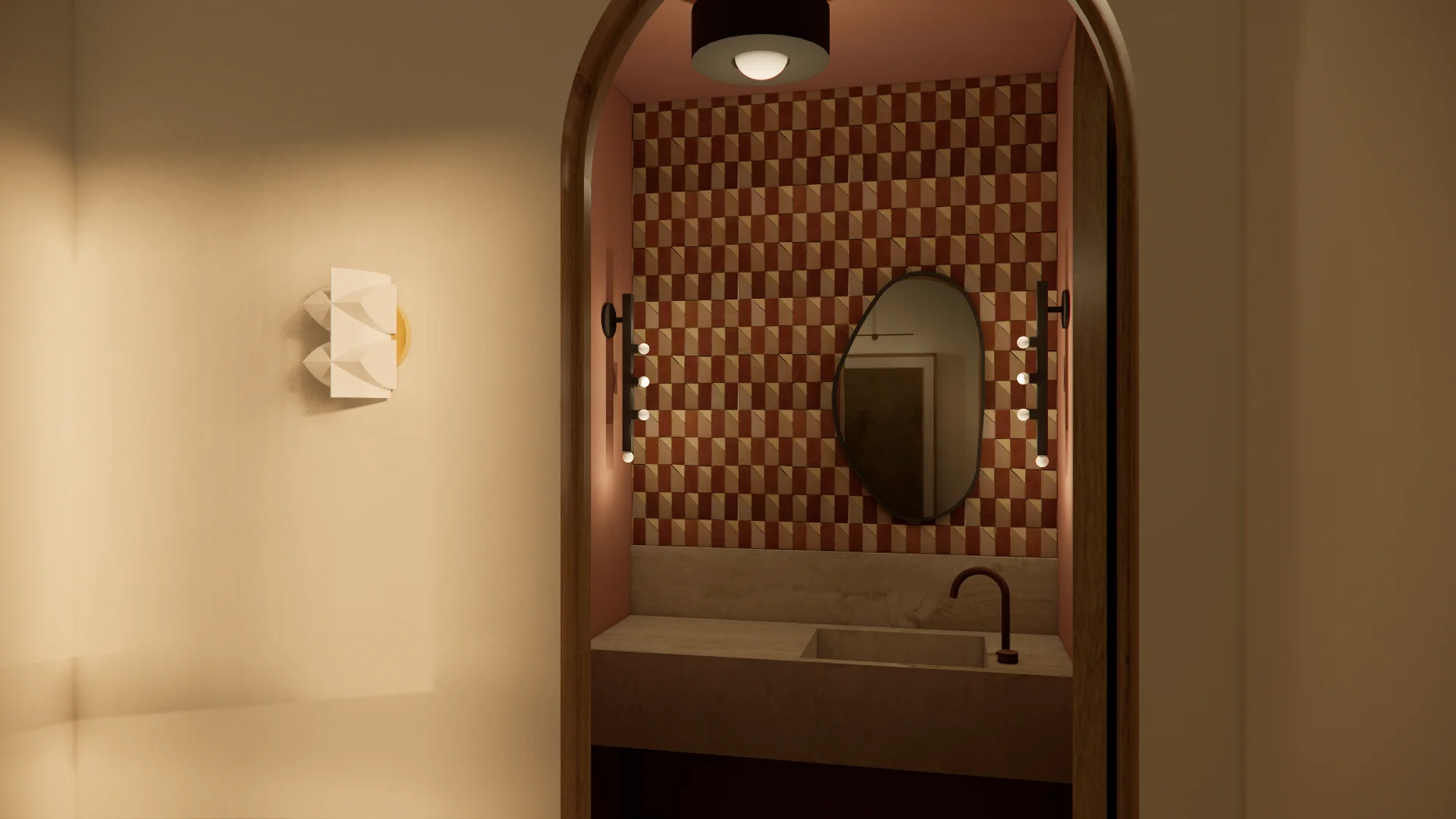 A minimalist bathroom alcove with warm terracotta and cream tones features a geometric checkerboard tile accent wall, an oval mirror with integrated LED lighting, and a concrete sink with matte black fixtures, accessed through a curved archway opening from a neutral beige corridor.